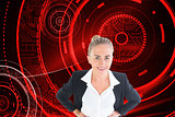 Composite image of businesswoman standing with hands on hips