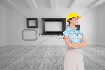 Composite image of smiling attractive architect posing