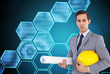 Composite image of serious architect holding plans and hard hat