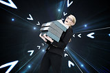Composite image of businesswoman carrying folders