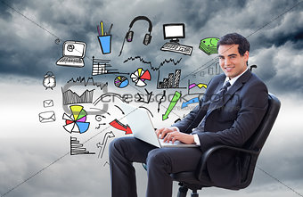 Composite image of young businessman sitting on an armchair working with a laptop