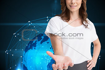 Composite image of attractive brunette presenting her hand