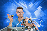 Composite image of portrait of confused it professional with screw driver and cables in front of ope