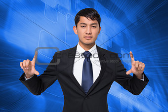 Composite image of unsmiling businessman holding