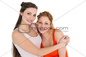 Portrait of a young female embracing her friend