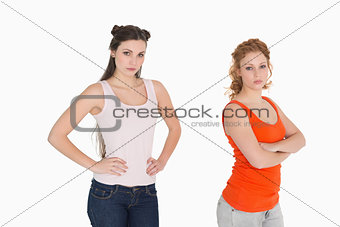 Unhappy female friends not talking after argument