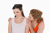 Young woman consoling female friend