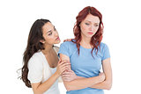 Young woman consoling female friend