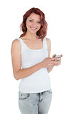 Portrait of smiling casual woman text messaging