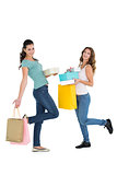 Two happy female friends with shopping bags