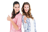 Portrait of two female friends gesturing thumbs up