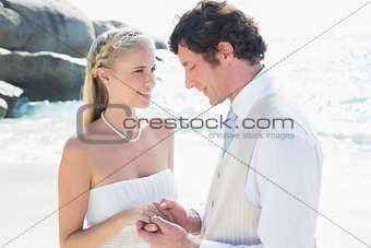 Pretty bride smiling at new husband