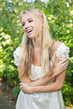 Blonde pretty bride laughing