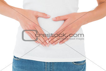 Mid section of a casual woman with stomach pain