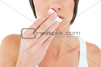 Close-up mid section of a woman with bleeding nose