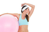 Fit woman kissing muscles  with fitness ball
