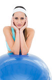 Fit young woman with fitness ball