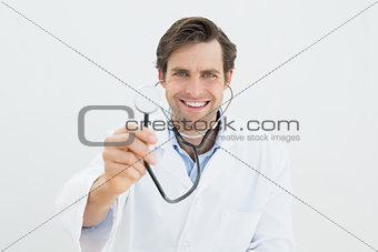 Portrait of a smiling male doctor with stethoscope