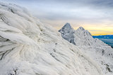 Winter mountains view with frozen ice and snow