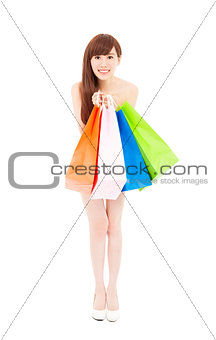 shopping woman holding many shopping bags excited