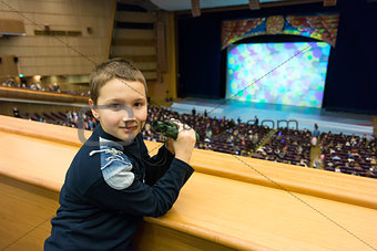 Boy in theater