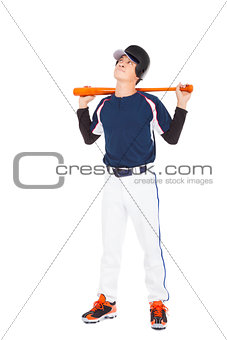 Young adult baseball player holding bat and thinking
