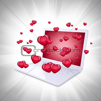 Red hearts fly out of the laptop