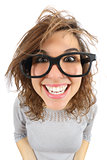 Wide angle view of a geek woman with glasses smiling