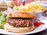 American cheese burger with fresh salad 