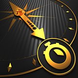 Golden Stopwatch Icon on Black Compass.