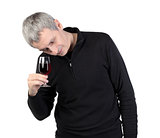 Man drink a glass of red port wine
