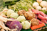 fresh root vegetable carrot potatoes onion beet on market 