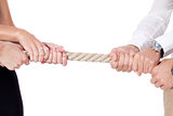 business woman against businessman pulling rope isolated