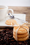 fresh aromatic coffee and cookies on table