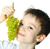 Boy with grapes