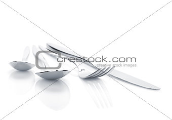 Silverware or flatware set of fork, spoons and knife