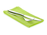 Silverware or flatware set of fork and knife on towel