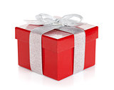 Red gift box with silver ribbon and bow
