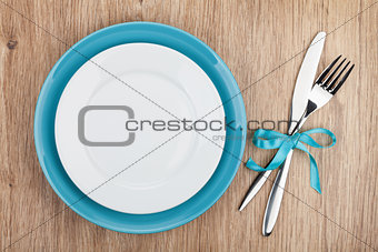 Fork with knife and blank plates