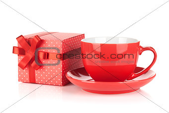 Red coffee cup and gift box with bow