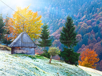 autumn mountain sunshine view with shed