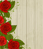 Wooden background with red roses