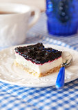 Delicious blueberry squares cake with whip cream 