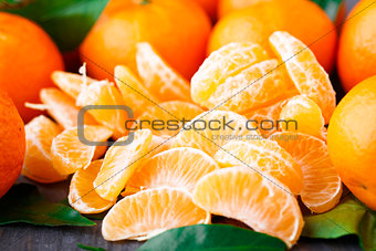 Tangerines on wooden background