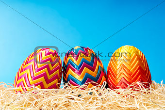 Easter eggs in hay