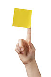 female teen hand holding sticky note