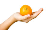 tangerine on the palm of the child