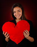 Girl Holding a Big Plush Heart