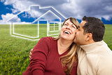 Happy Couple Sitting in Grass Field with Ghosted House Behind