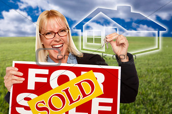 Woman with Sold For Sale Sign, Keys and Ghosted House